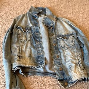 Slightly cropped distressed jean jacket